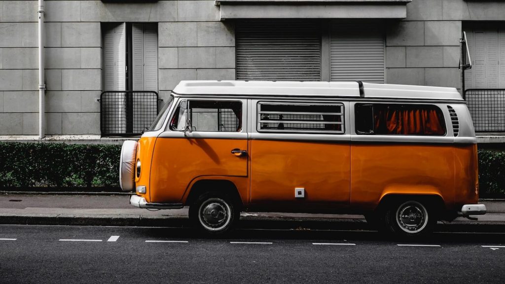 A Volkswagen Microbus, reminiscent of the iconic 'hippie van.'